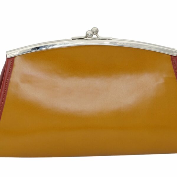 le sac à main marilyne en cuir véritable de couleur mordoré. Vanamantys propose ce jolie sac à main brun mordoré. l'artisan français de maroquinerie emploi un cuir de haute qualité permettant d'obtenir un sac à main 100% cuir de haute maroquinerie française.